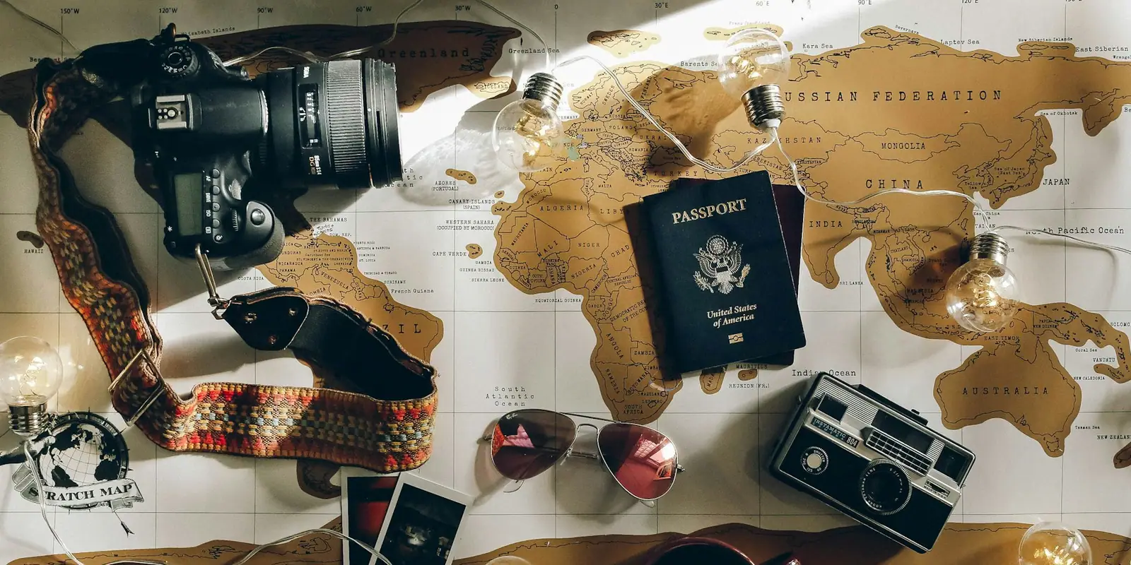 Camera and passport ready for a trip