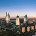 Baku skyline and Flame Towers under a blue sky