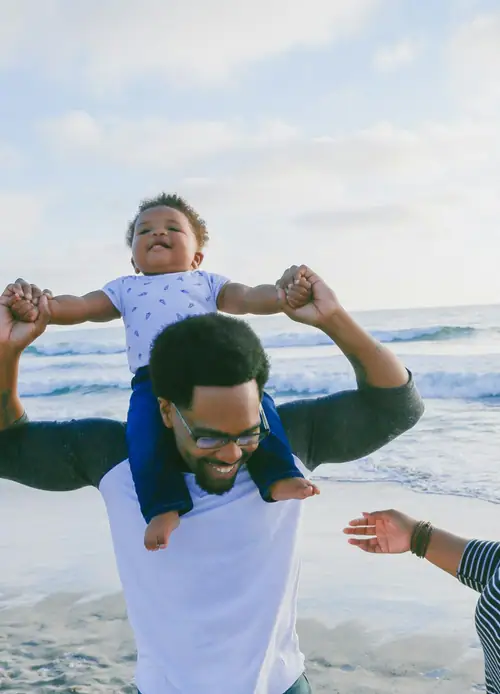 Family enjoying a beach holiday together
