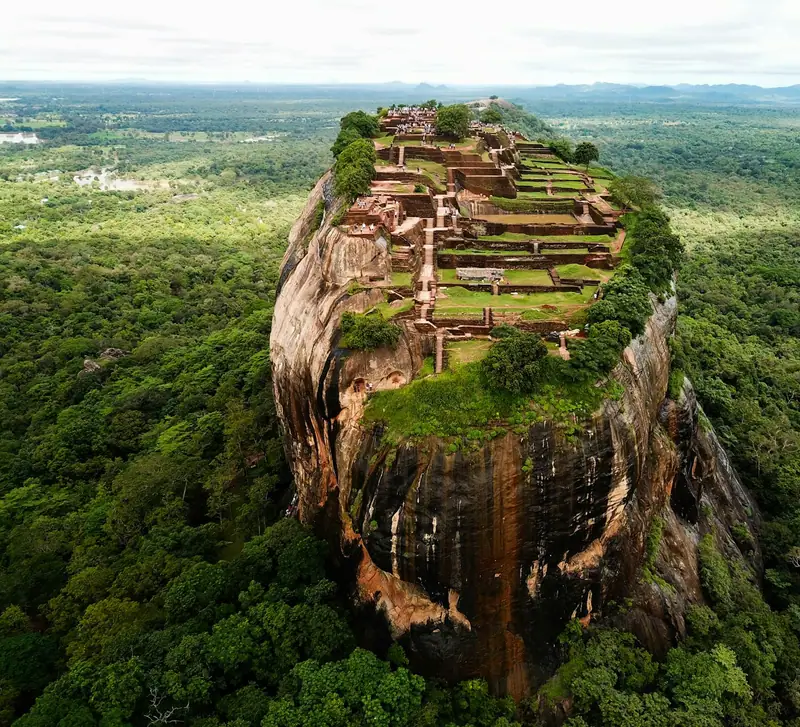 Aerial view of the Sigiriya rock fortress above the forest